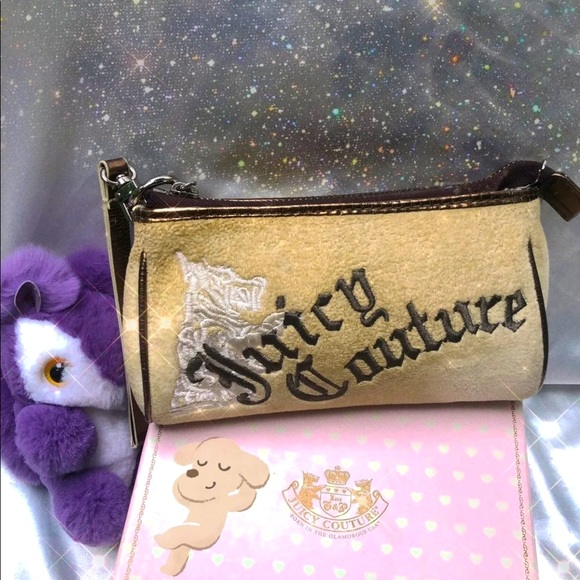 Juicy Couture Handbags - ✨Rare JUICY COUTURE Cream Wrisrlet / Clutch ❤️